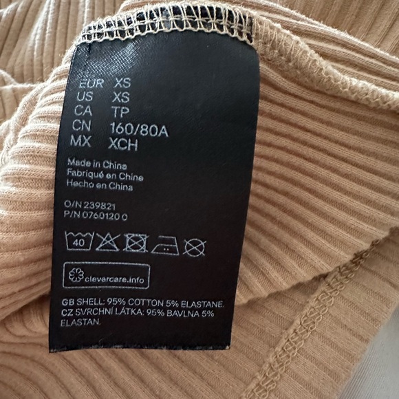 Beige half sleeve top. Only work a few times. Great condition. - Picture 2 of 2